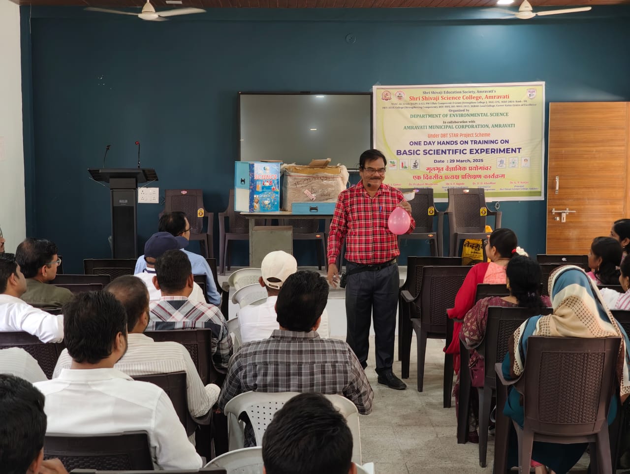 Mr. Sanjay Tikaria showing  Air Pressure Expt.to the teachers