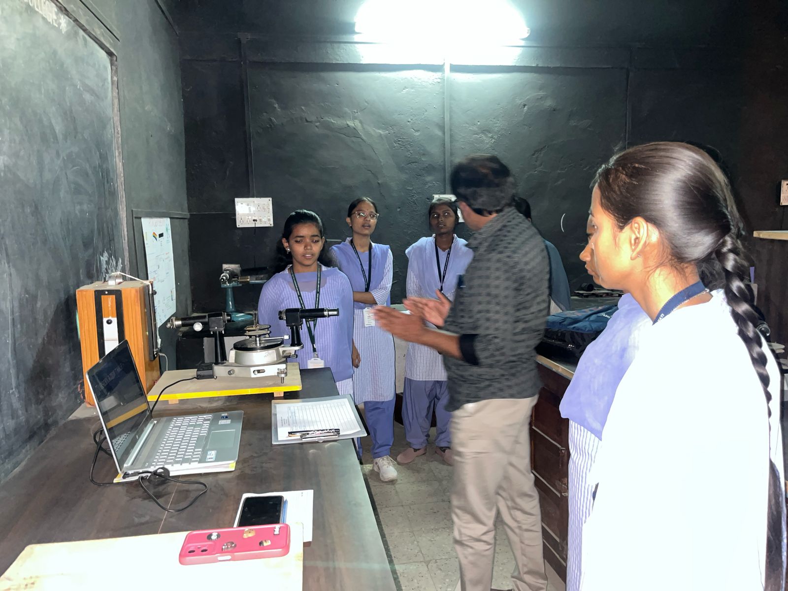 Students demonstrating classic experiments in physics