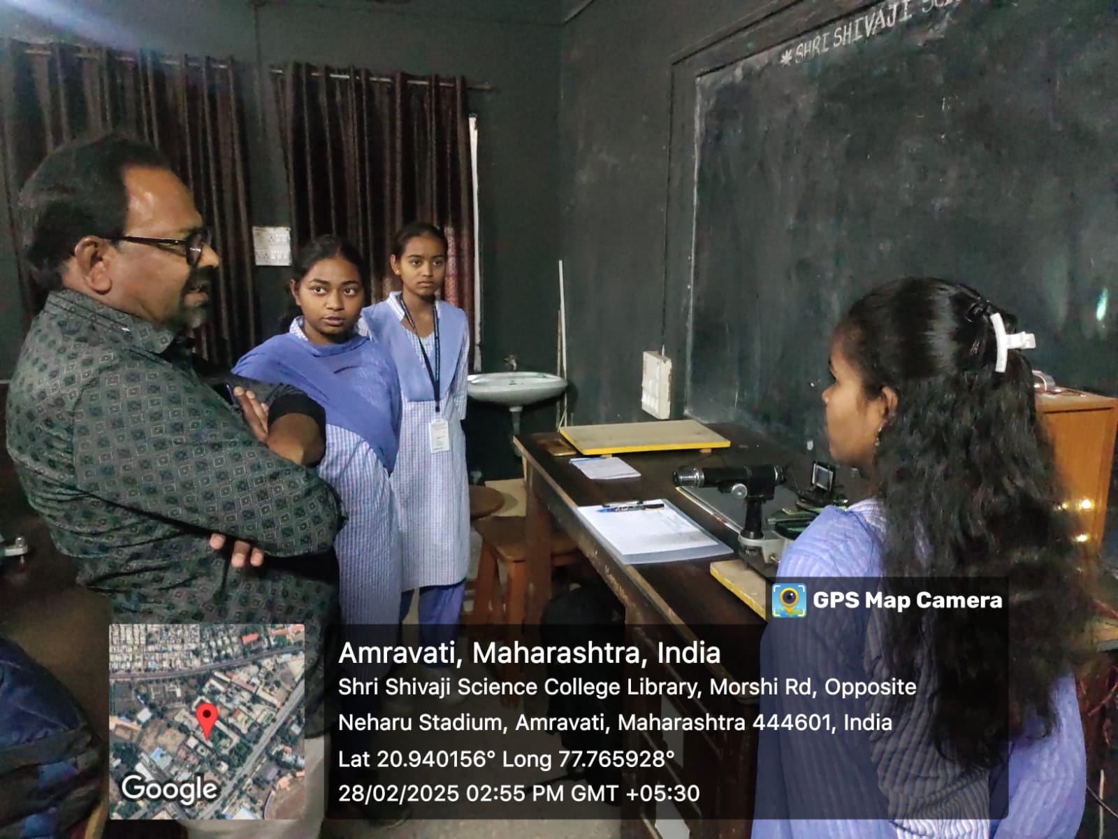 Students demonstrating classic experiments in physics