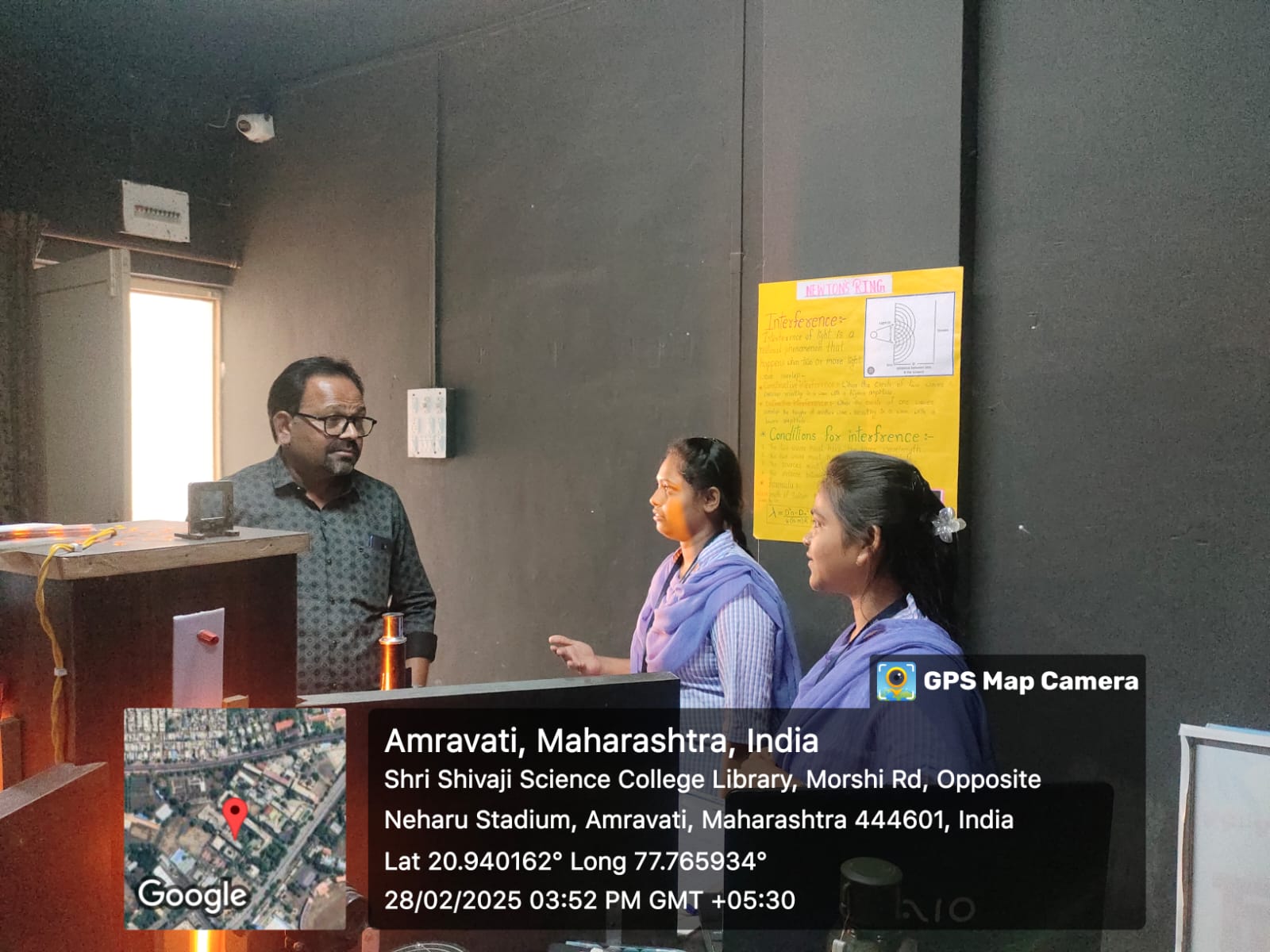 Students demonstrating classic experiments in physics