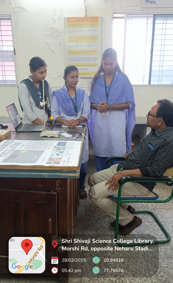 Students demonstrating classic experiments in physics
